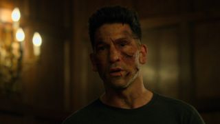 Frank Castle with face cut up in The Punisher