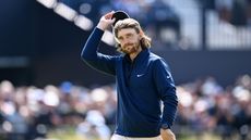 Tommy Fleetwood acknowledges the crowd after an opening 66 at the 2023 Open