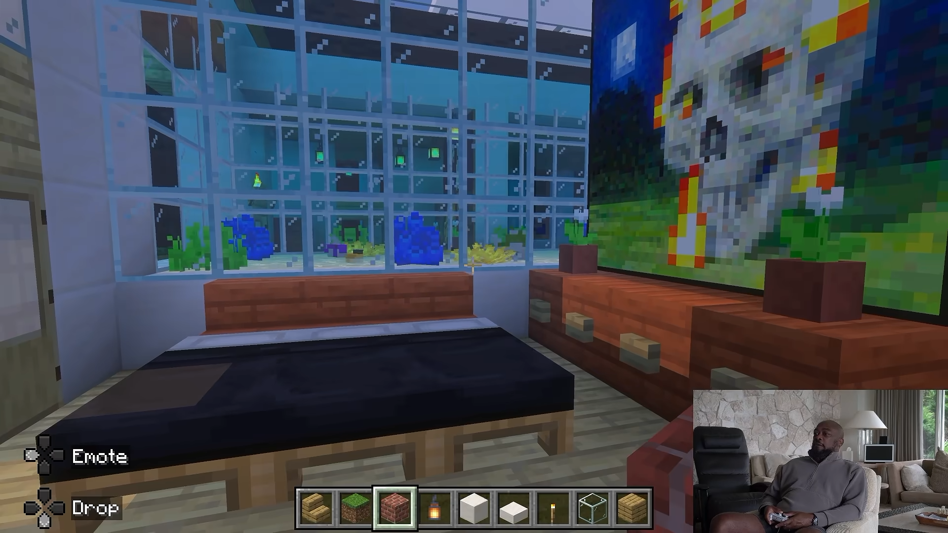 Tomlin showing an apartment with adjacent aquarium in his 12-year Minecraft city build.