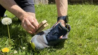 how to clean hiking boots: scrub