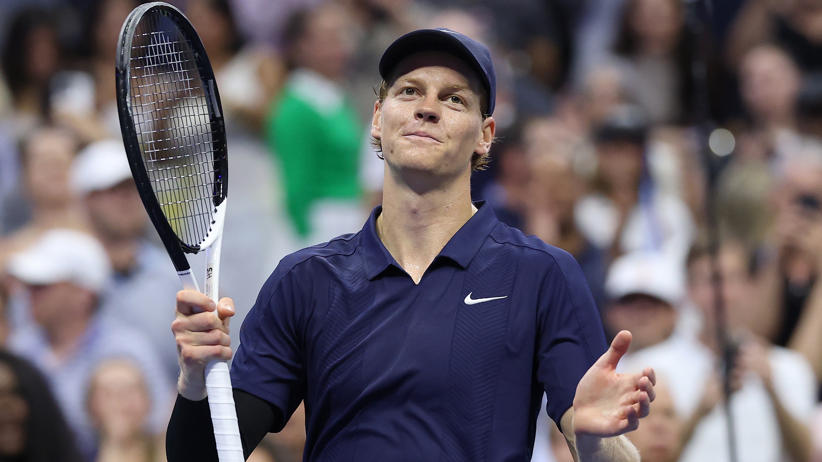 Jannik Sinner at the 2025 US Open taking in the crowd after his victory.