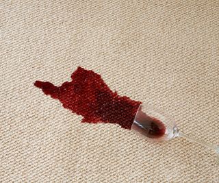 red wine spill on cream carpet