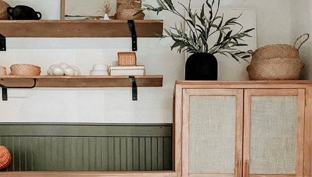 laundry room with cupboard and shelving