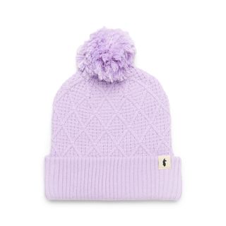 A lilac Cotopaxi Tozo beanie with a pom pom on the top