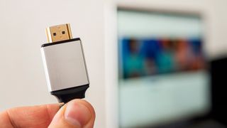 HDMI line connecting the audio and video system of notebook to projector or TV