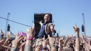 Frank Carter performing offstage at Reading 2016