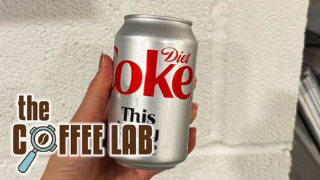 a photo of a diet coke with the coffee lab logo