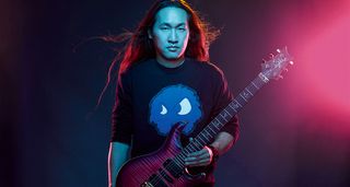 A portrait of Herman Li of DragonForce with his new PRS custom build