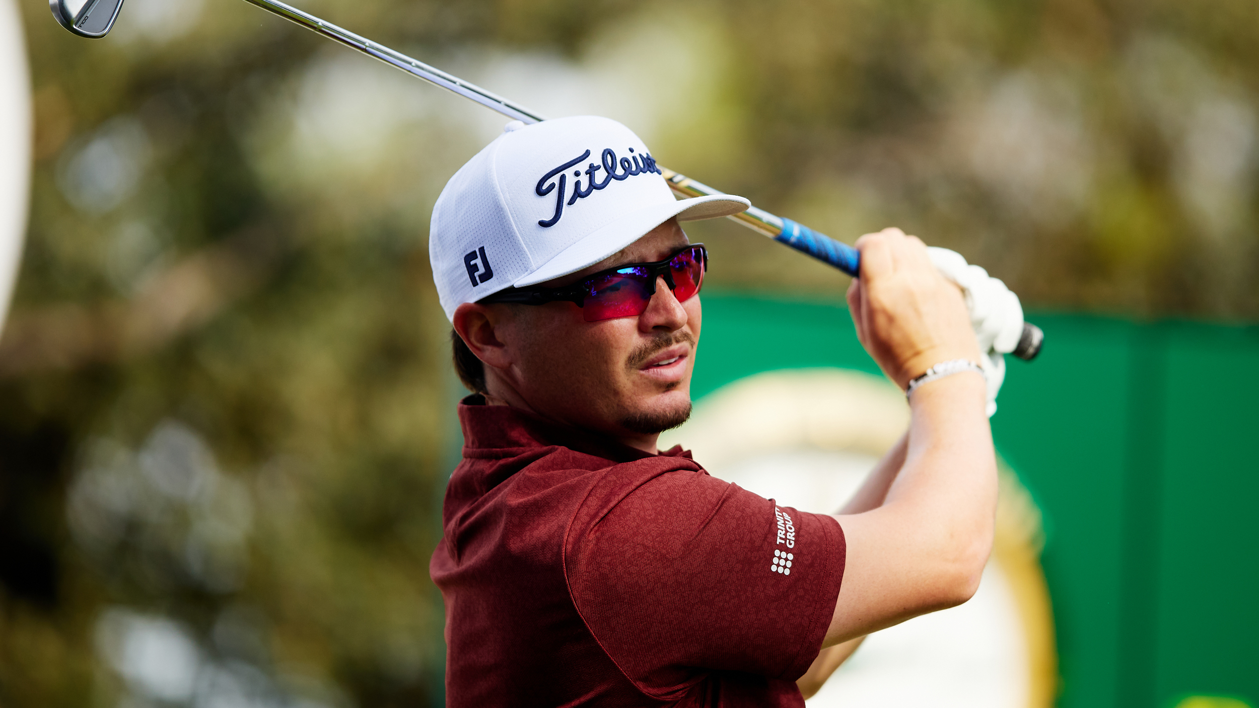 Ewen Ferguson hits an iron shot during the 2025 Open de España