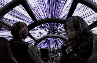 The Millennium Falcon spaceship makes the jump to light speed in the movie Star Wars Episode IV: A New Hope.