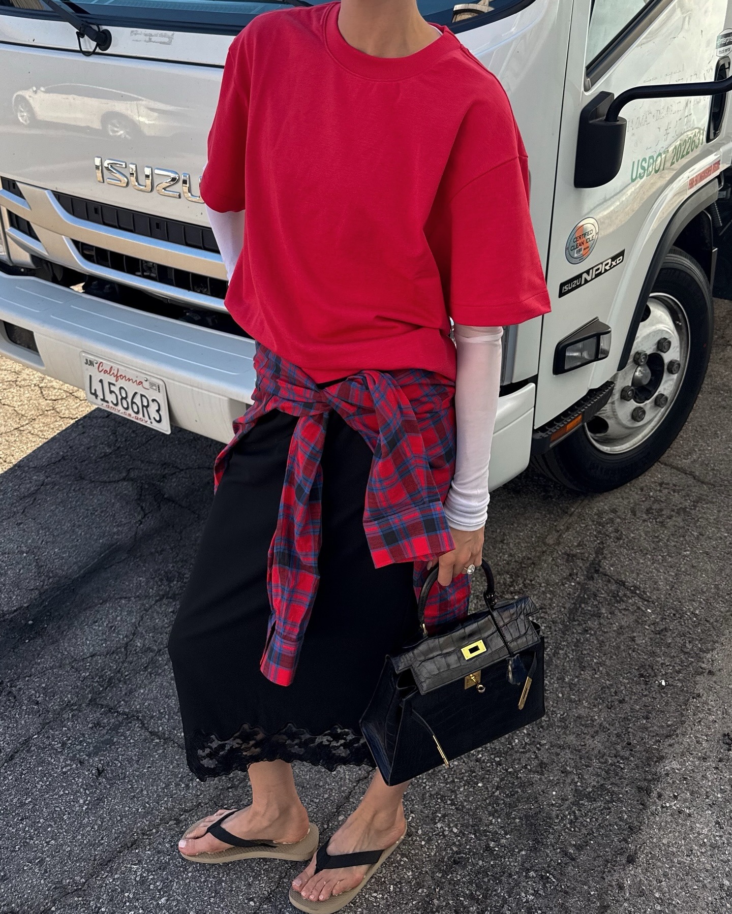 Elsa Hosk wears checkered shirt fall trend outfit.