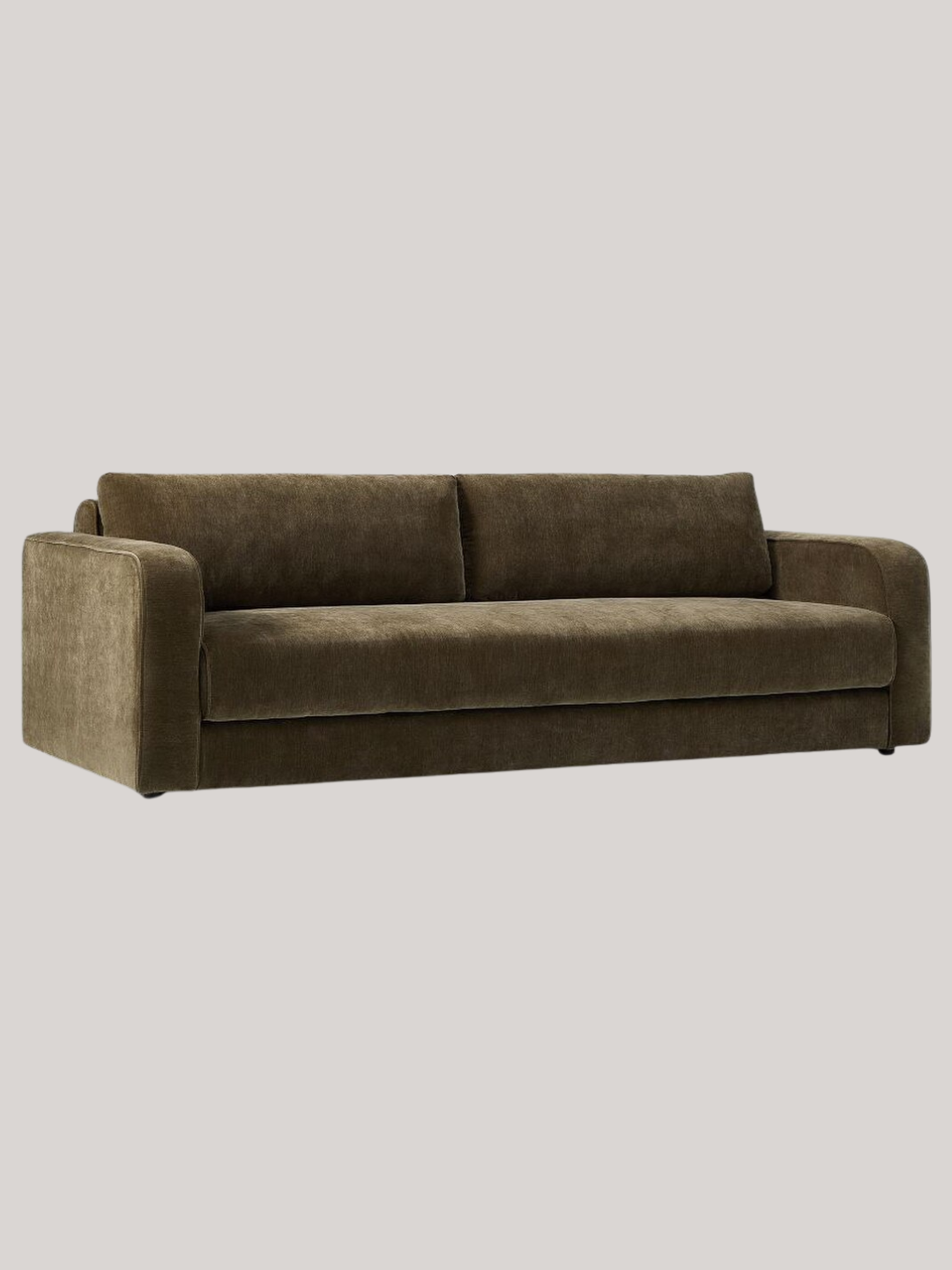 A deep green king size sofa bed from West Elm
