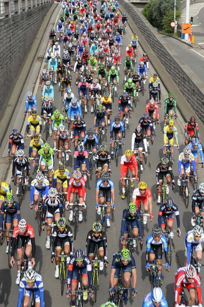 The colourful sight of the peloton leave Liege