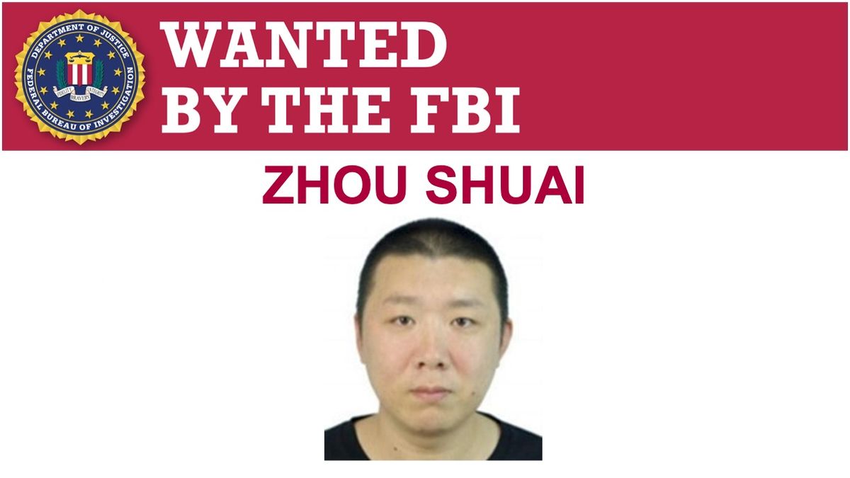 An FBI wanted poster for alleged hacker Zhou Shuai.