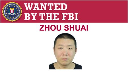 An FBI wanted poster for alleged hacker Zhou Shuai.