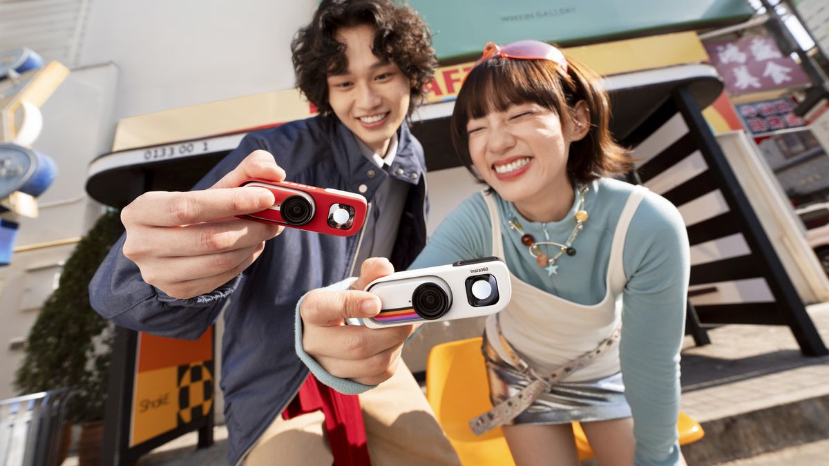 Insta360 Go 3S Retro edition, with the thumb-szied action camera slotted into the Retro Bundle's viewfinder case, in both available colors, held by two people