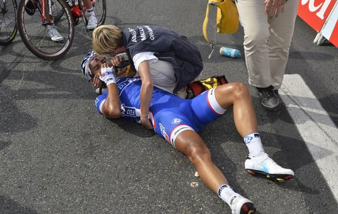 Nacer Bouhanni (FDJ) on the ground after a high-speed crash in the stage 5 finale