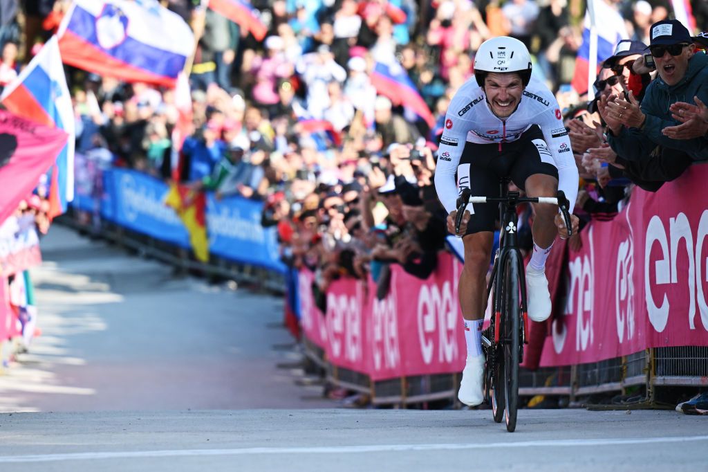 MONTE LUSSARI ITALY MAY 27 Joo Almeida of Portugal and UAE Team Emirates White Best Young Rider Jersey crosses the finish line during the 106th Giro dItalia 2023 Stage 20 a 186km individual climbing time trial stage from Tarvisio 750m to Monte Lussari 1744m UCIWT on May 27 2023 in Monte Lussari Italy Photo by Stuart FranklinGetty Images