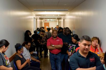 Houston voters wait in a long line.