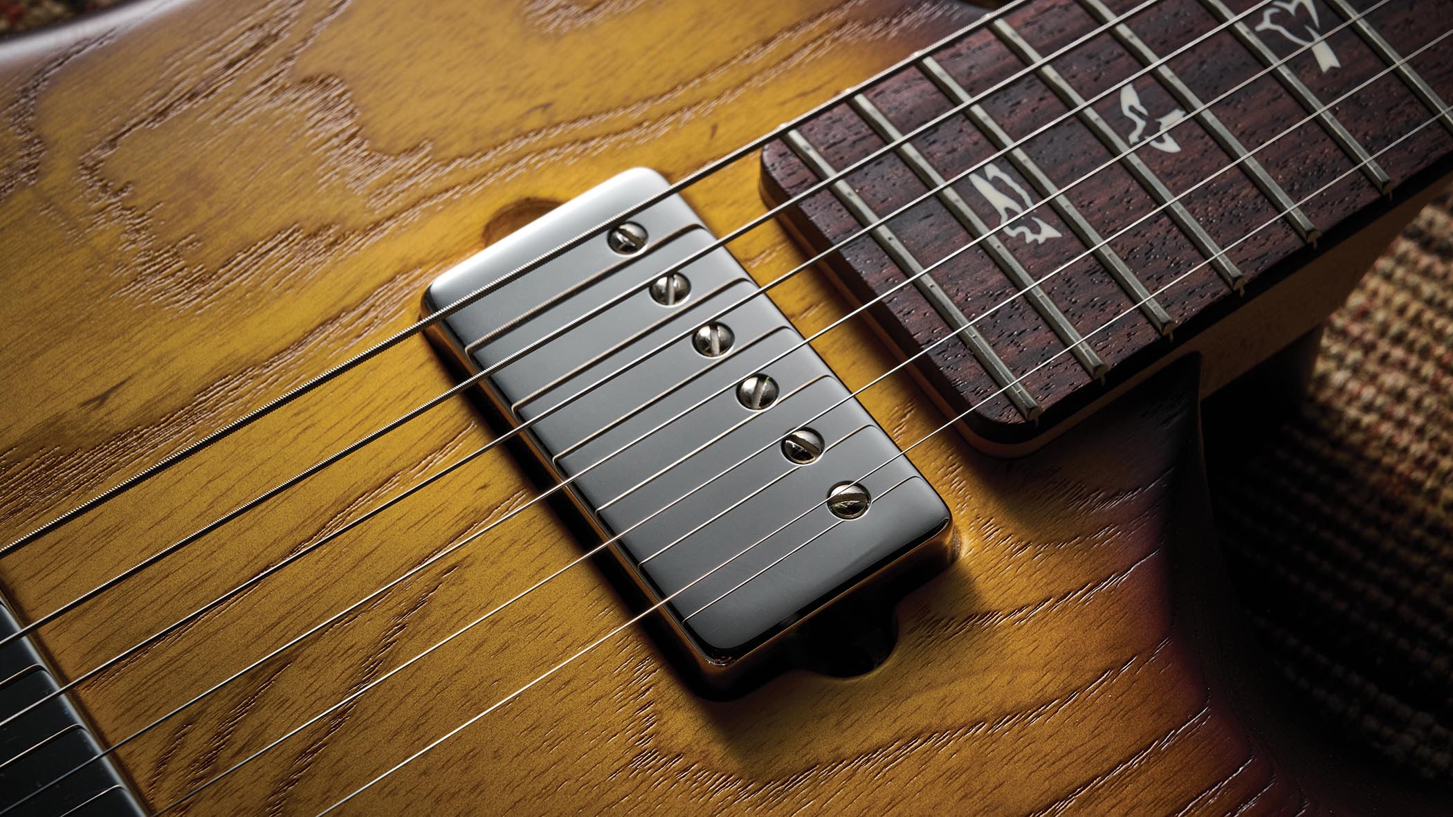 The PRS Fiore HH is a dual-humbucker doublecut with a Satin Sunflower finish