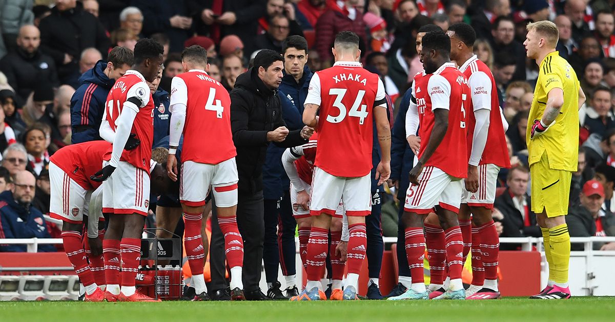 Arsenal Manager Mikel Arteta talks to his players during the Premier League match between Arsenal FC and Brentford FC at Emirates Stadium on February 11, 2023 in London, England.