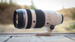 The OM System M.Zuiko 50-200mm f/2.8 IS Pro lens, mounted to the OM System OM-1 Mark II, in an outdoor setting