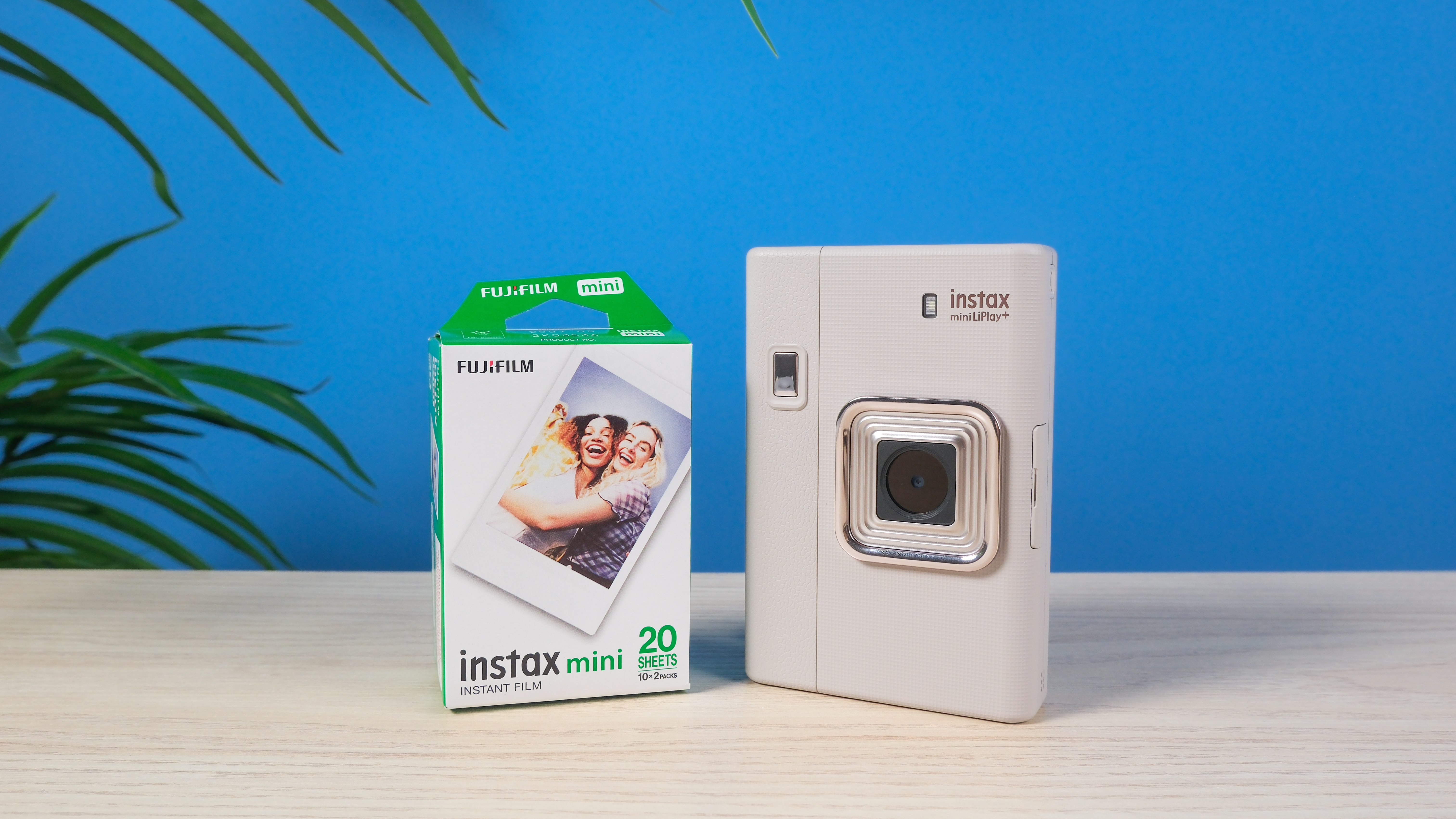 A Sand Beige Fujifilm Instax mini LiPlay Plus hybrid instant camera