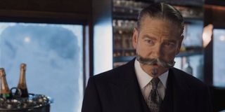 Murder on the Orient Express Poirot speaking in the bar car