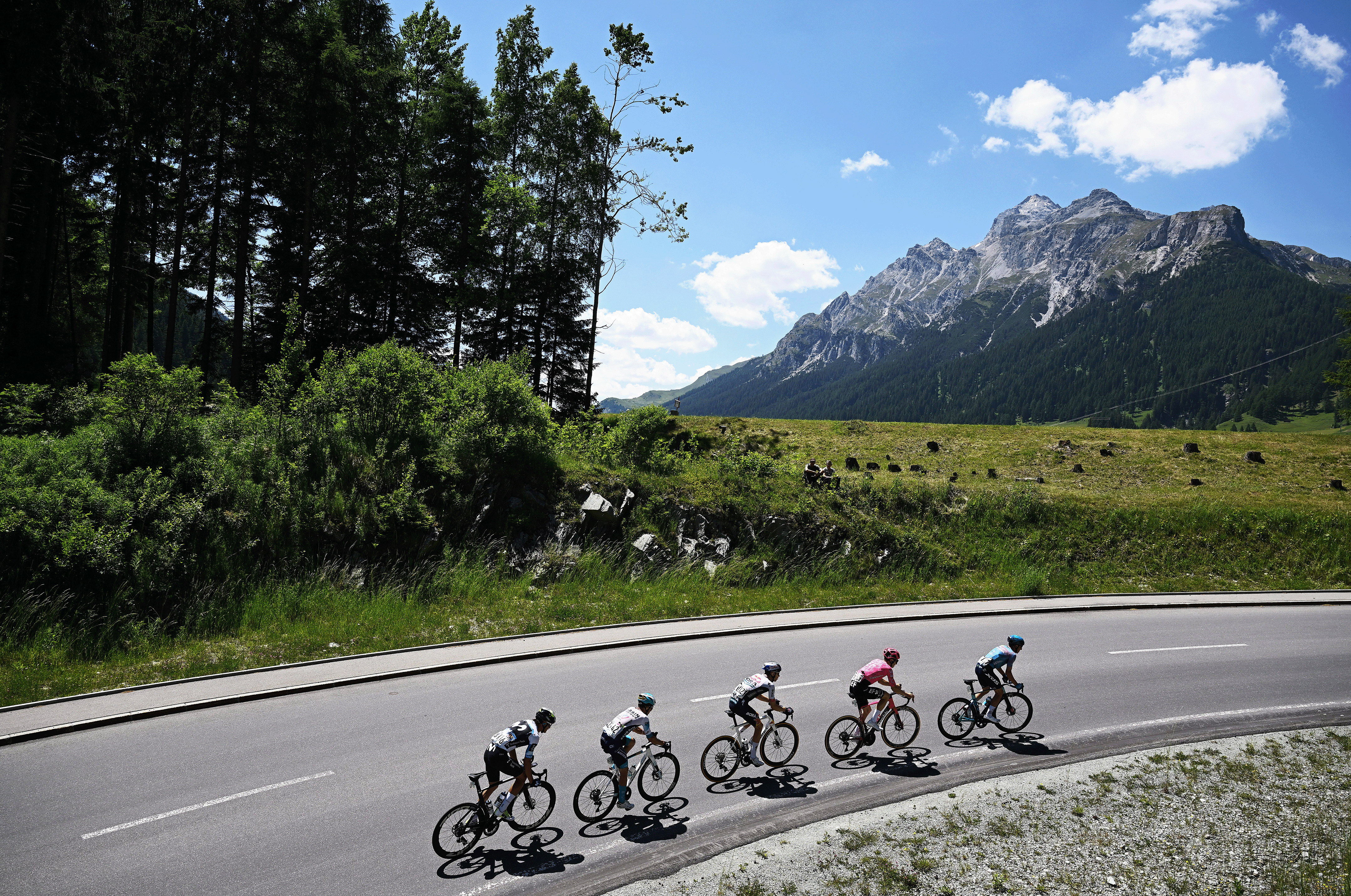 SANTA MARIA IN CALANCA, SWITZERLAND - JUNE 19: (L-R) Pello Bilbao of Spain and Team Bahrain - Victorious, Aleksandr Vlasov of Russia and Team Red Bull - BORA - hansgrohe, Javier Romo of Spain and Team Movistar, Lorenzo Fortunato of Italy and Team XDS Astana and Neilson Powless of United States and Team EF Education - EasyPost compete in the breakaway climbing to the Passo San Bernardino (1615m) during the 88th Tour de Suisse, Stage 5 a 183.8km stage from La Punt to Santa Maria in Calanca 941m / #UCIWT / on June 19, 2025 in Santa Maria in Calanca, Switzerland. (Photo by Tim de Waele/Getty Images)