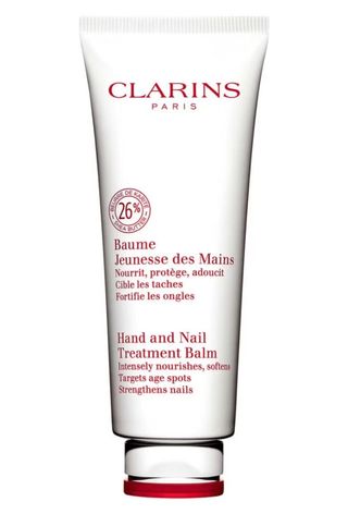 An image of Clarins Hand and Nail Treatment Balm, a French beauty essential.