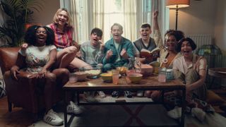 Heartstopper season 2 core cast around a coffee table