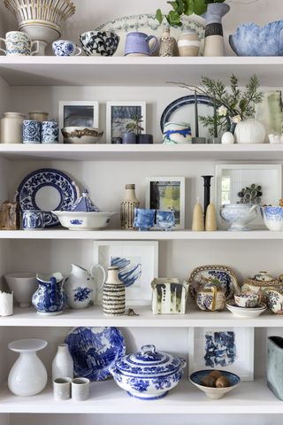Shelves filled with blue and white ceramics