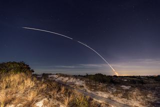 Ryan Morrill Photography captured this view of the nighttime Minotaur 1 rocket launch from Wallops Island, Va., as it streaked over his location at Barnegat Light, N.J, on Nov. 19, 2013.">Ryan Morrill Photography