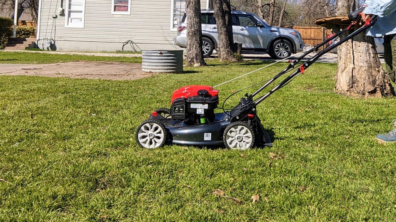 Troy-Bilt TB310B XP 21 in. 163 cc Briggs and Stratton Ready Start Engine 3-in-1 Gas RWD Self Propelled Lawn Mower being tested in writer's yard