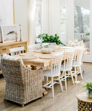 Coastal decor dining room with a rattan chair and woven placemats