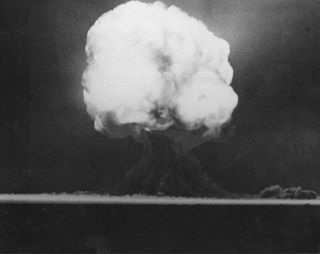 The Trinity fireball, 15 seconds after detonation of the first atomic bomb on July 16, 1945, rises into the air above the desert near the town of San Antonio, New Mexico.