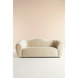 white curved back couch