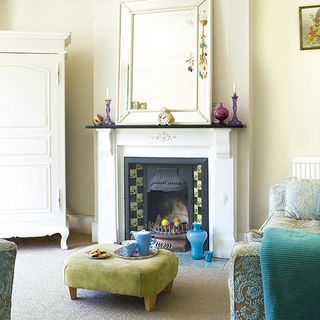 Living room with fire place and cupboard