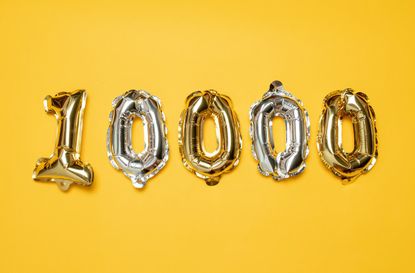 Gold and silvr 10,000 number balloons on yellow background. Followers and Subscription Concept