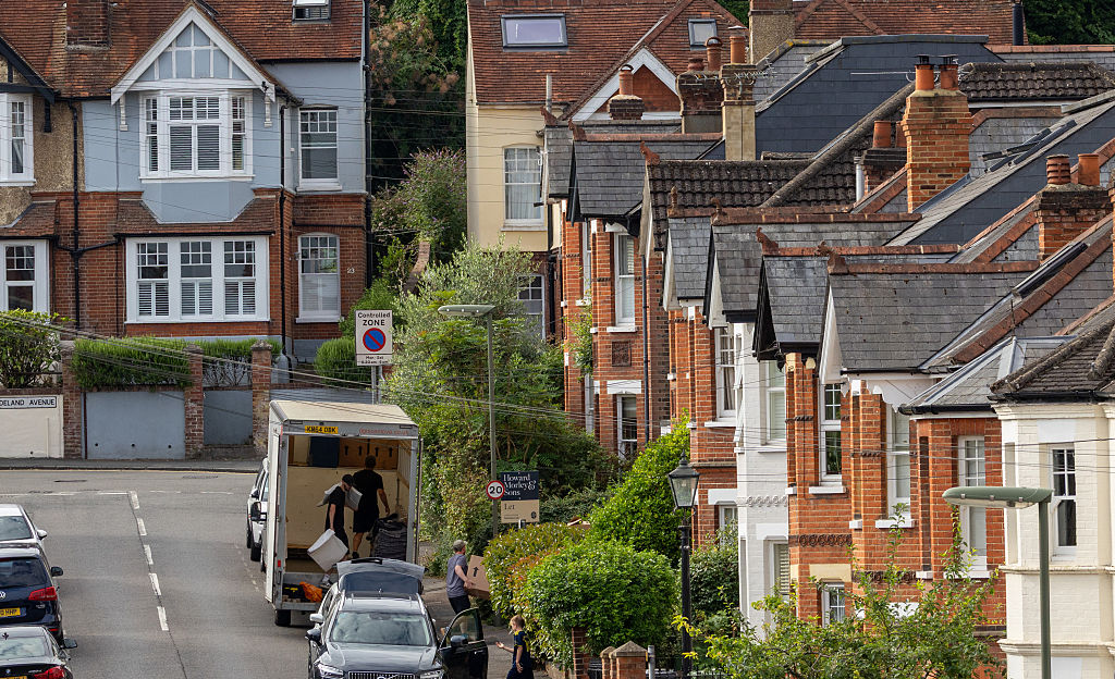 House removal workers outside a residential property in Guildford, UK, on Monday, July 28, 2025. The number of UK home loans given the green light rose to a three-month high in June