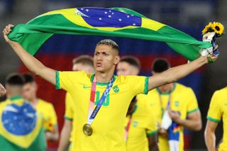 Richarlison celebrates after helping Brazil win Olympic gold at the 2020 Olympics in Tokyo.