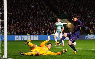 Celtic goalkeeper Fraser Forster denys Barcelona player Lionel Messi during the UEFA Champions League Group G match between Celtic and Barcelona at Celtic Park on November 7, 2012 in Glasgow, Scotland. (Photo by Stu Forster/Getty Images)