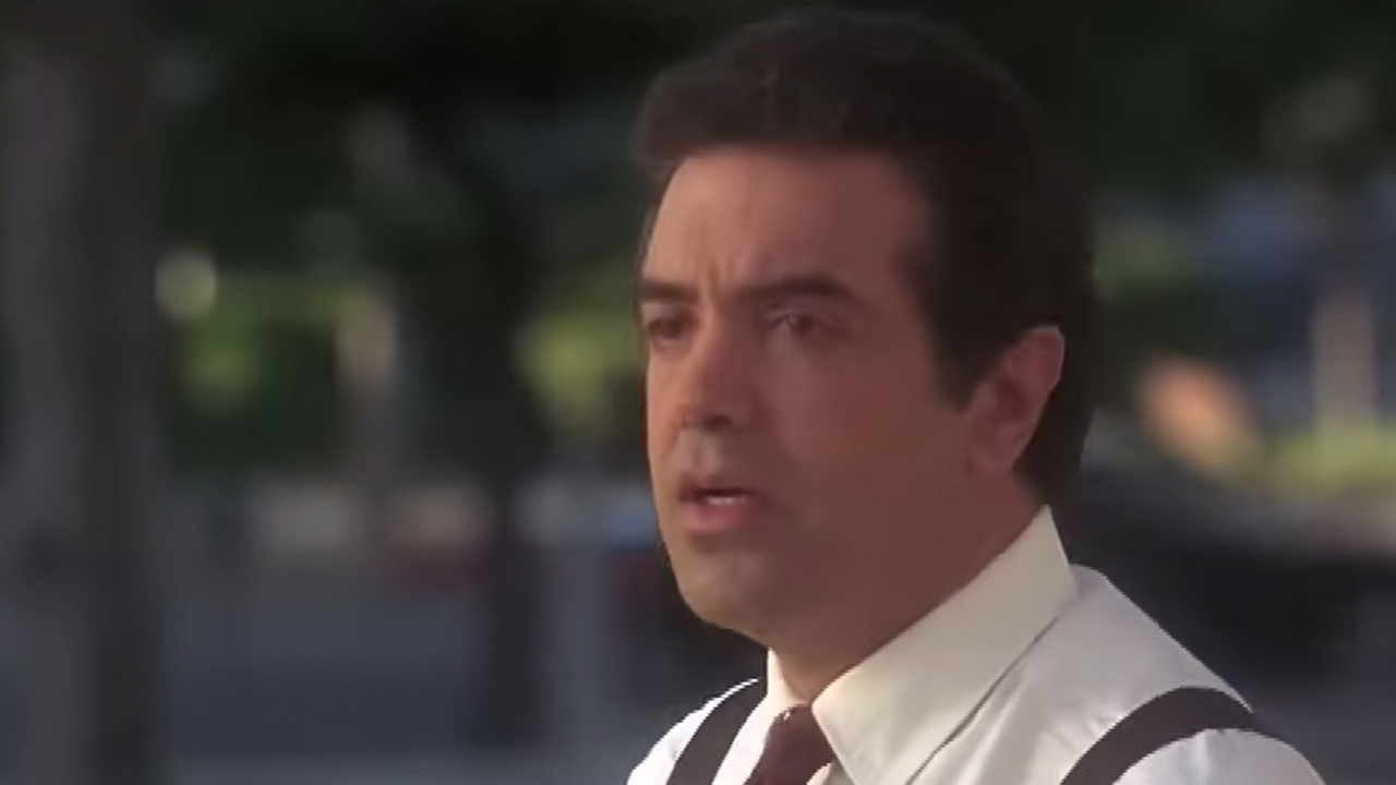 A close up of Chazz Palminteri looking shocked at the end of The Usual Suspects