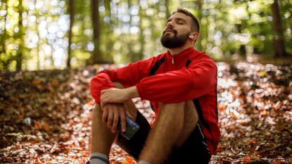 Man meditating outside