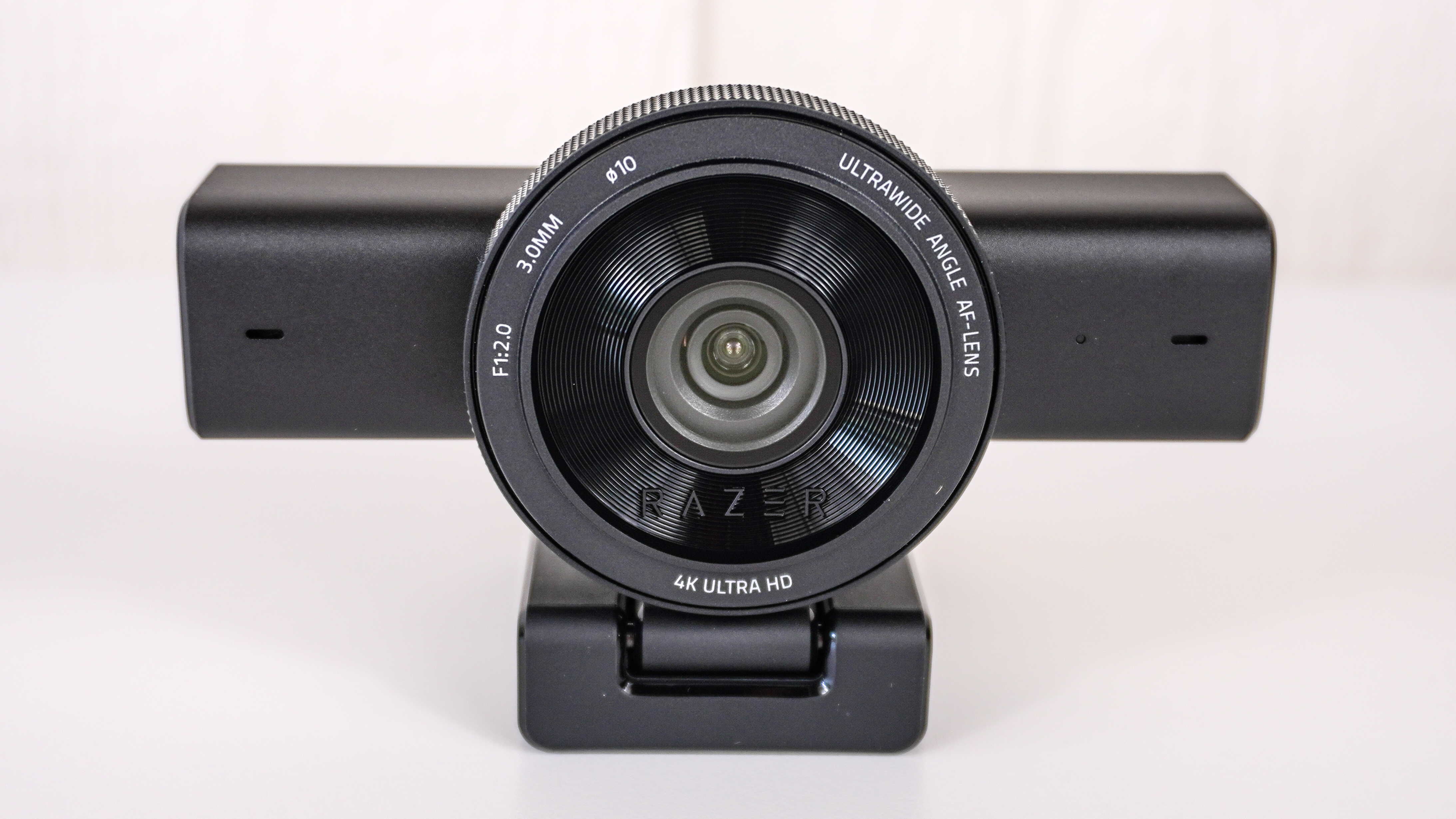 A straight on shot of the Razer Kiyo V2 webcam on a table