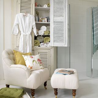 bathroom with chair and stool