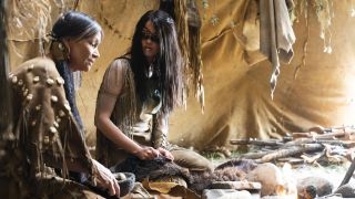Michelle Thrush's Aruka sits with Amber Midthunder's Naru in a Comache tepee in Prey