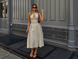 @styledsara outfit post in LPA linen midi dress.