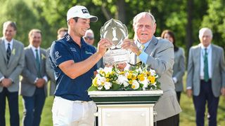 Viktor Hovland and Jack Nicklaus with the Memorial Tournament trophy
