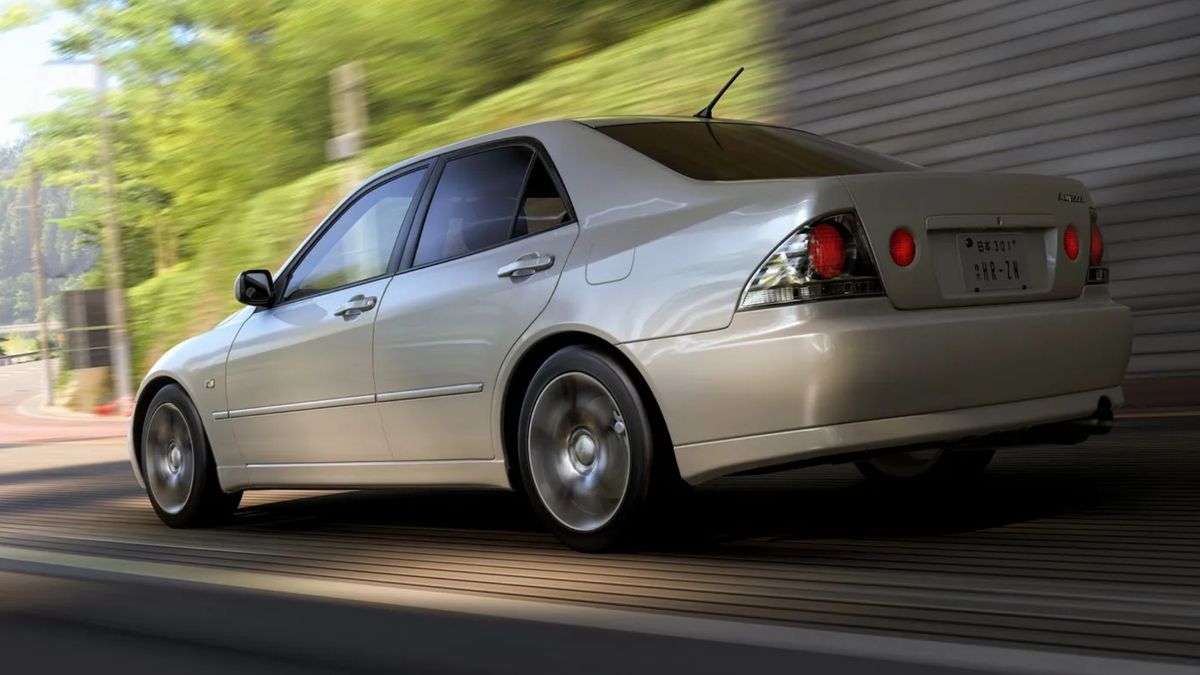Forza Horizon 6 Series 1: The 1999 Toyota Altezza RS200 Z EDITION racing down a road.